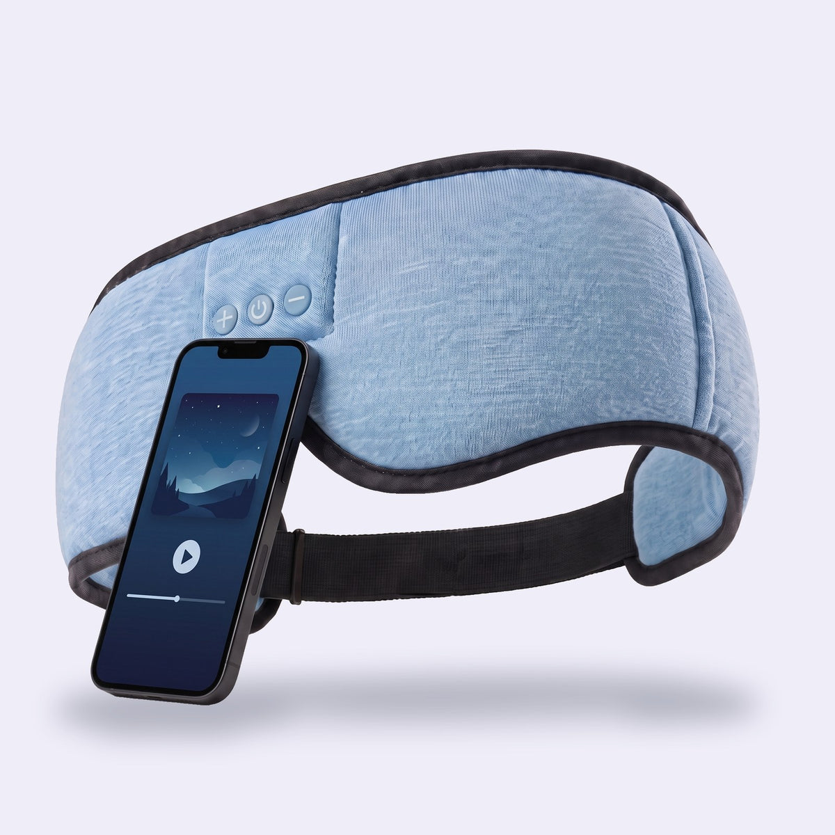 Hushband sleep headphones in sky blue knit next to a phone playing sleep sounds