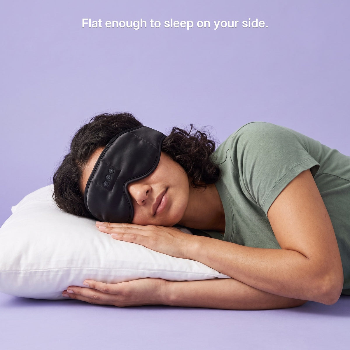 A woman sleeping on her side in the black satin Hushband