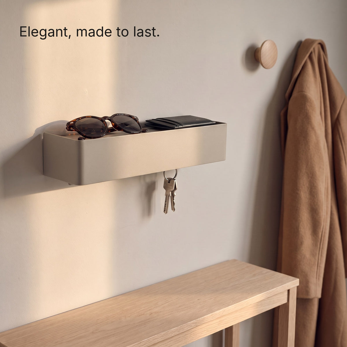 Key Shelf with sunglasses and a card holder above a console