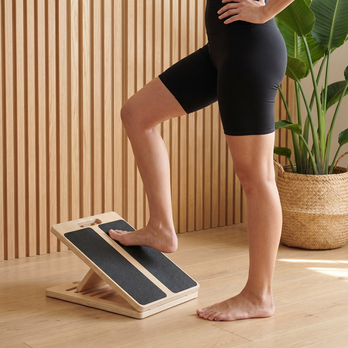 Stepping onto the Incline Stretch Board barefoot