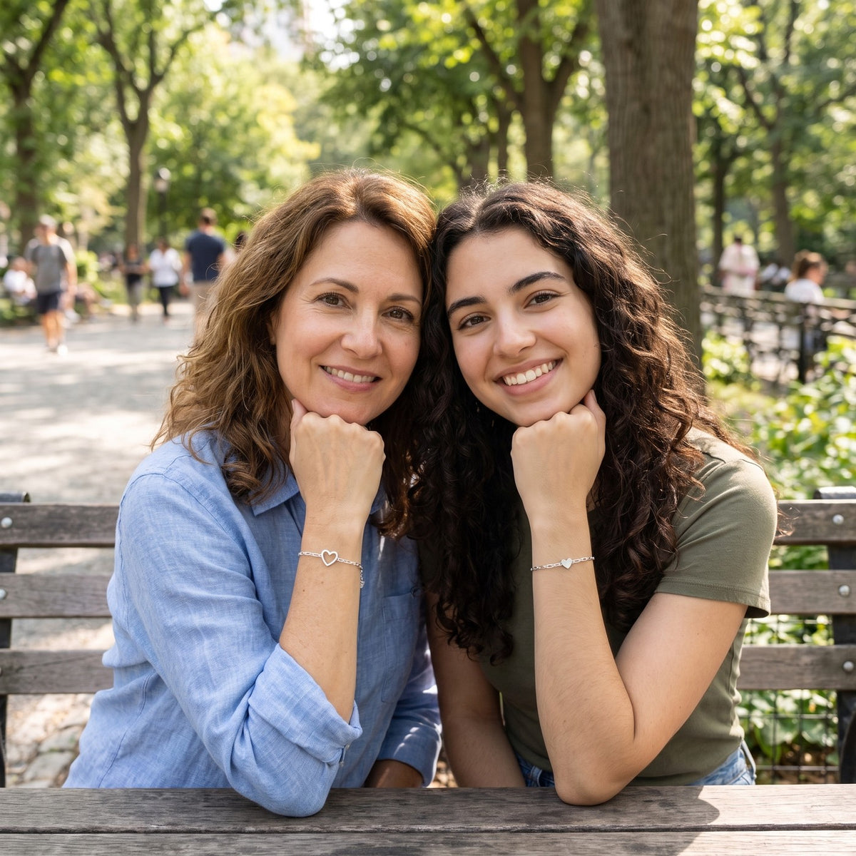 Mother and daughter in the park wearing silver NARA Bond
