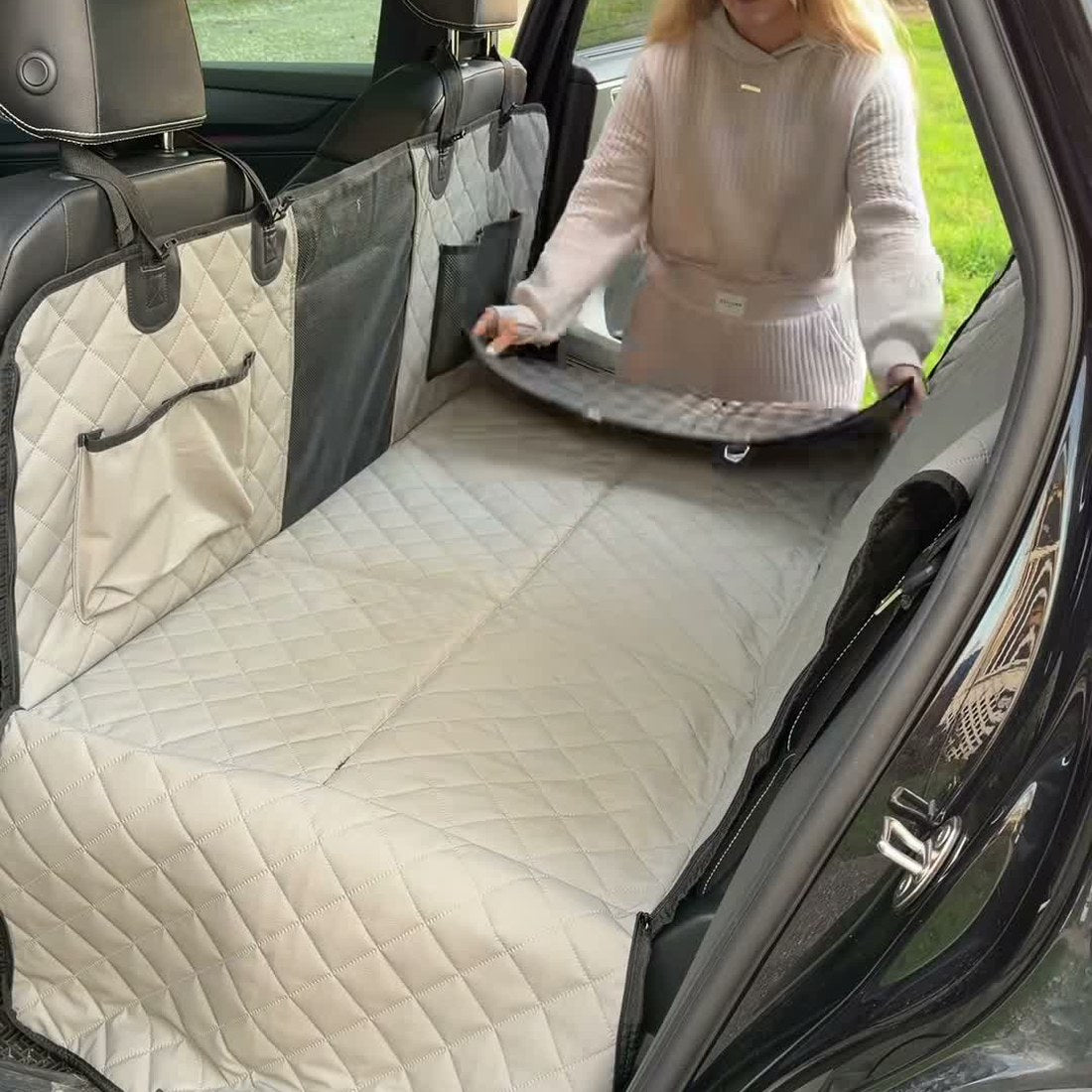 Grey — Grey cover fitted across the back seat, sides zipped up