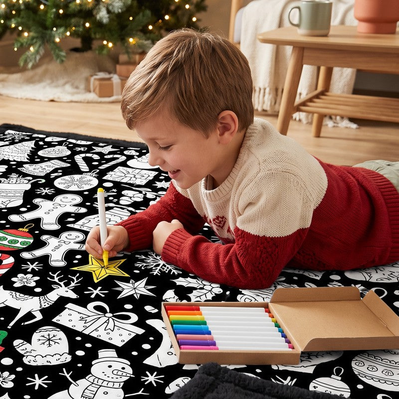 A boy colouring the Christmas blanket