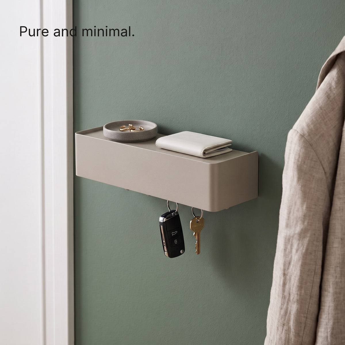 Key Shelf on a green hallway wall