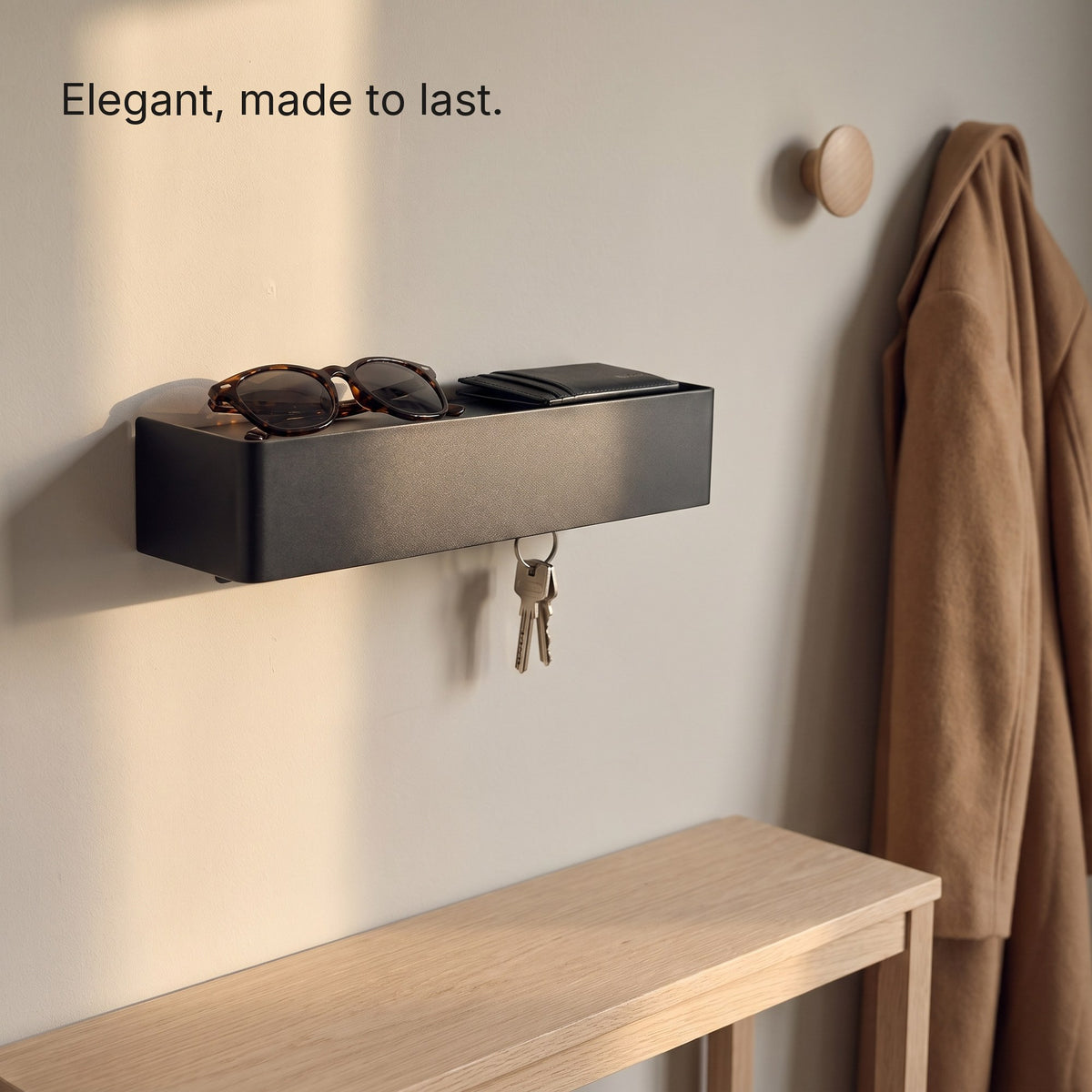 Key Shelf with sunglasses and a card holder above a console