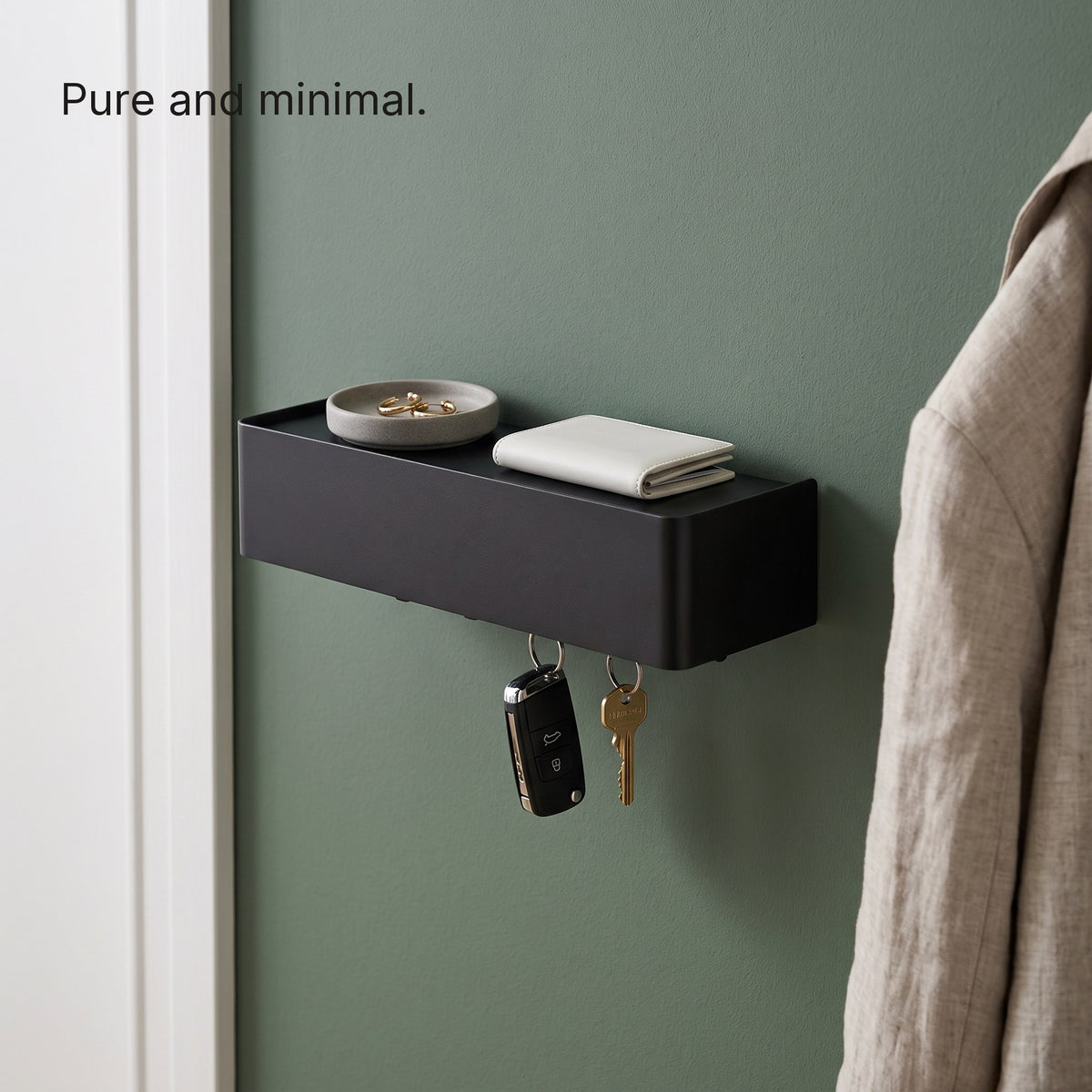Key Shelf on a green hallway wall