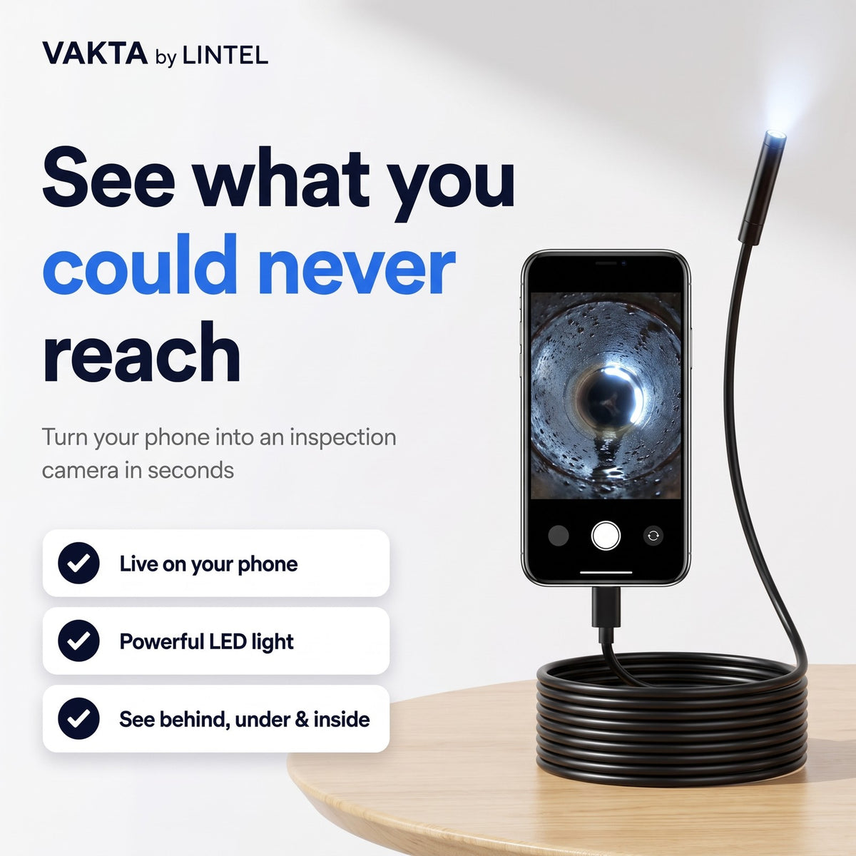 VAKTA inspection camera plugged into a phone showing a live picture inside a pipe