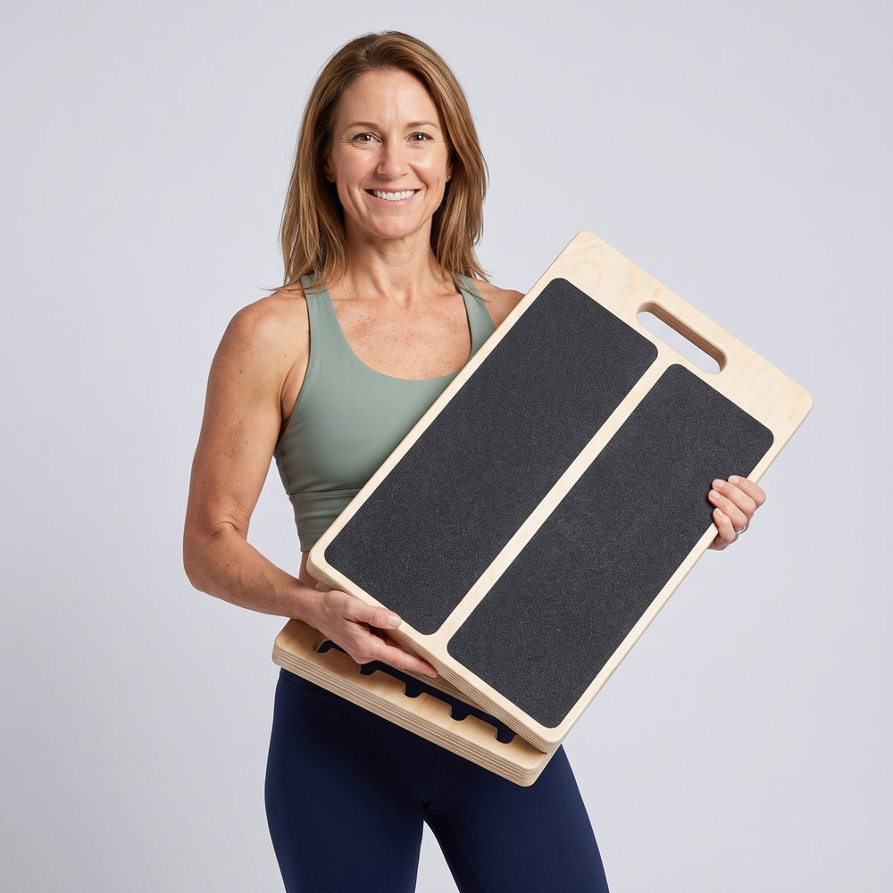 Woman holding the Incline Stretch Board