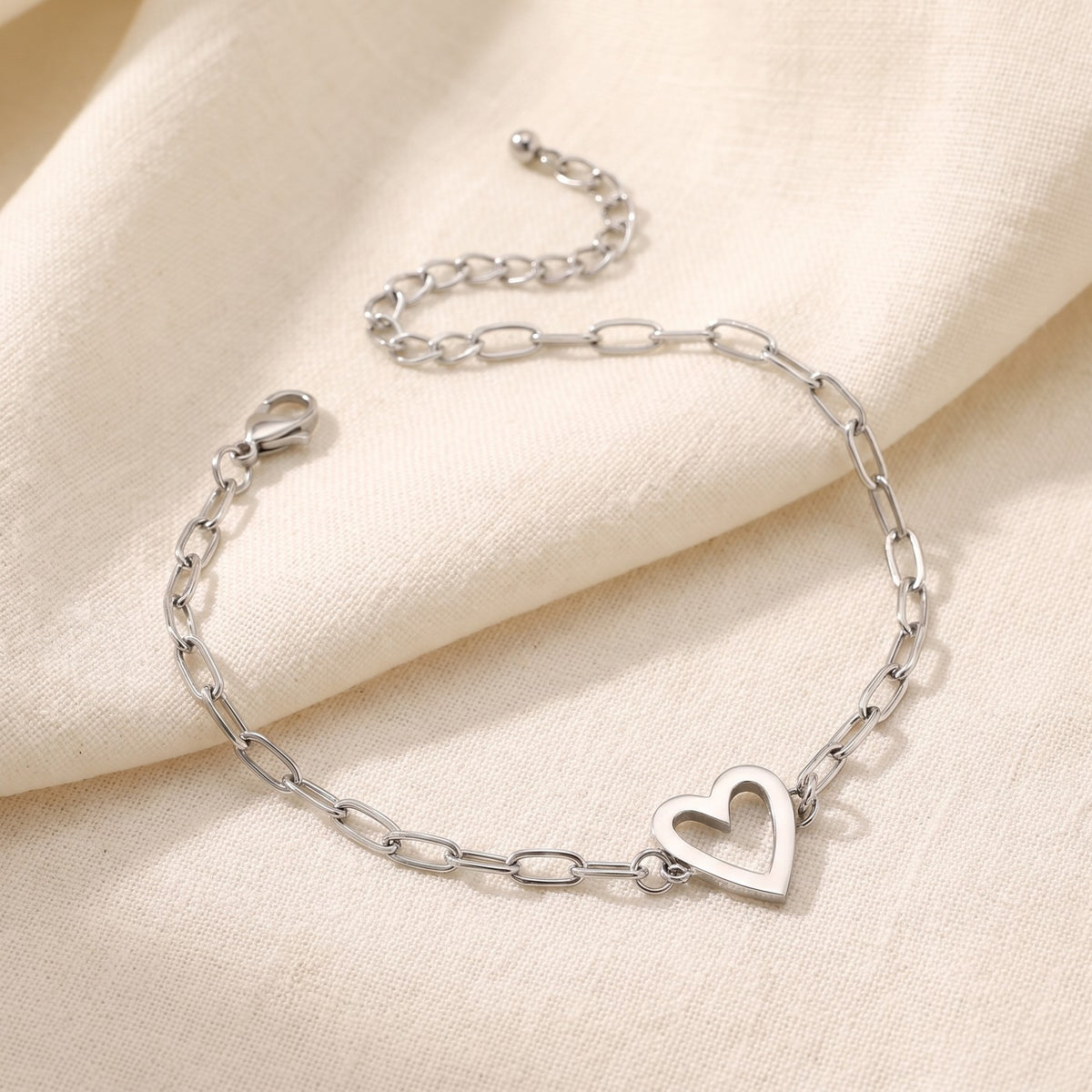 Silver bracelet with the open heart