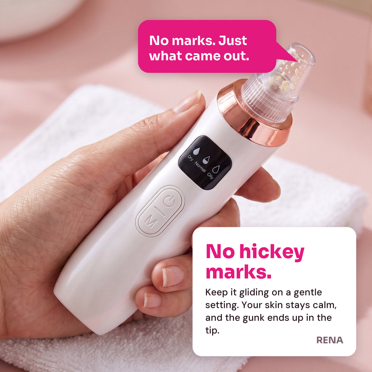 Hand holding the RENA pore vacuum with lifted oil visible in the clear tip