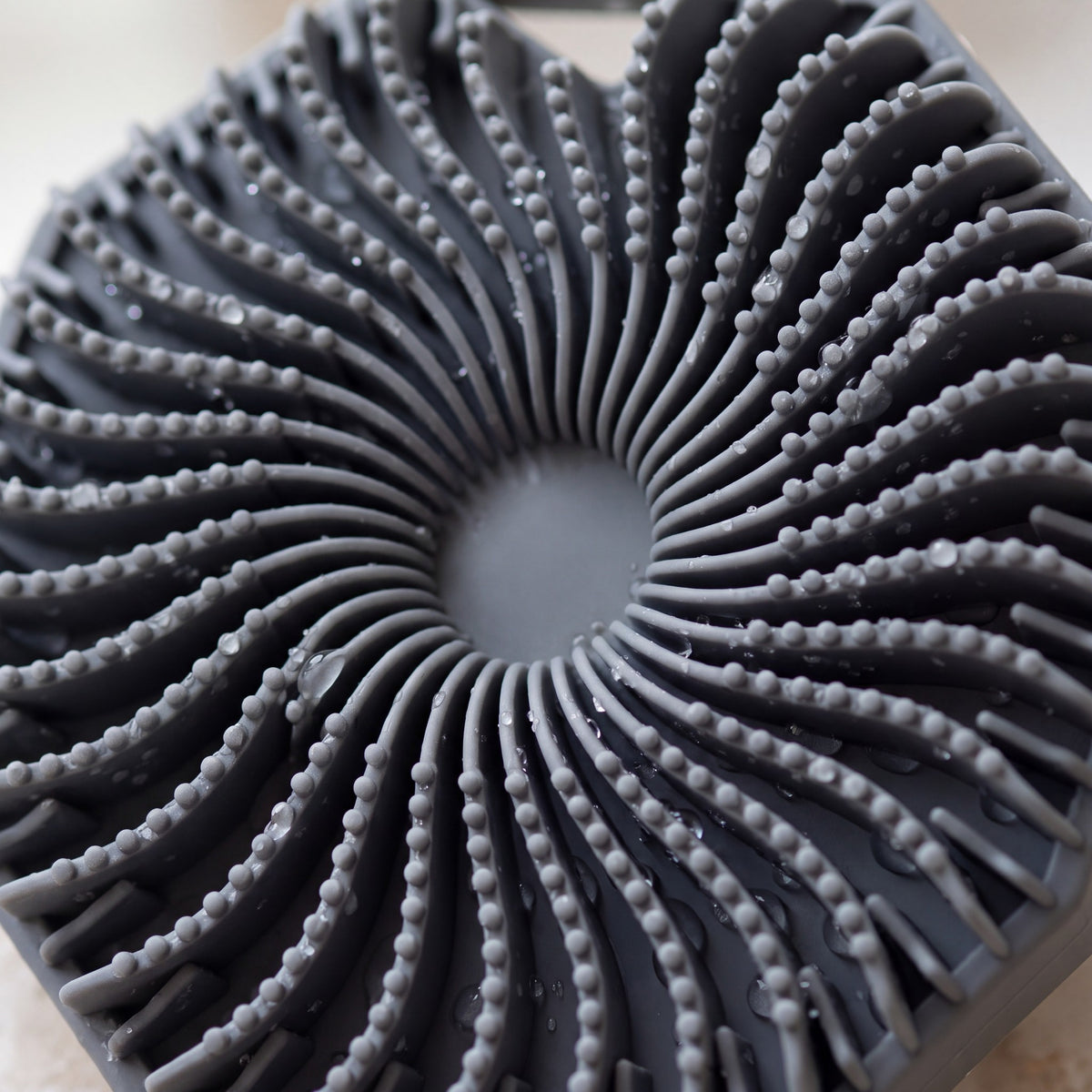 Close-up of the soft silicone fins with water droplets