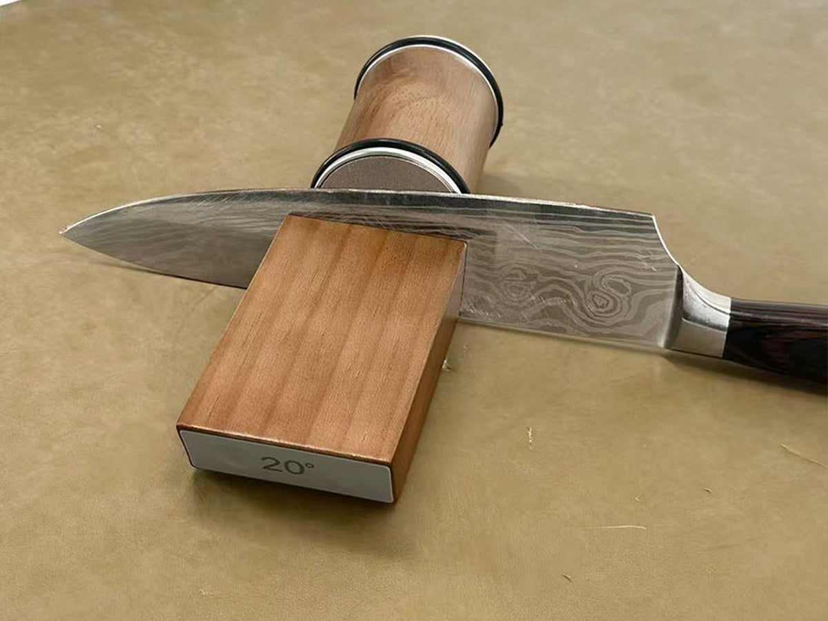 Chef's knife held by the magnetic angle block