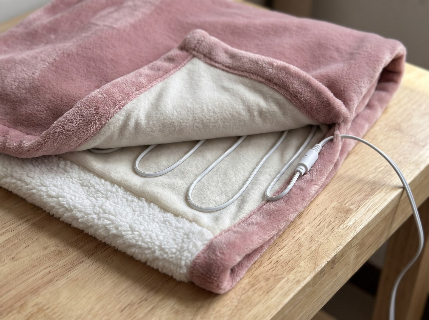 Inside VARMA: the thin, flexible heating wire between the flannel and the sherpa